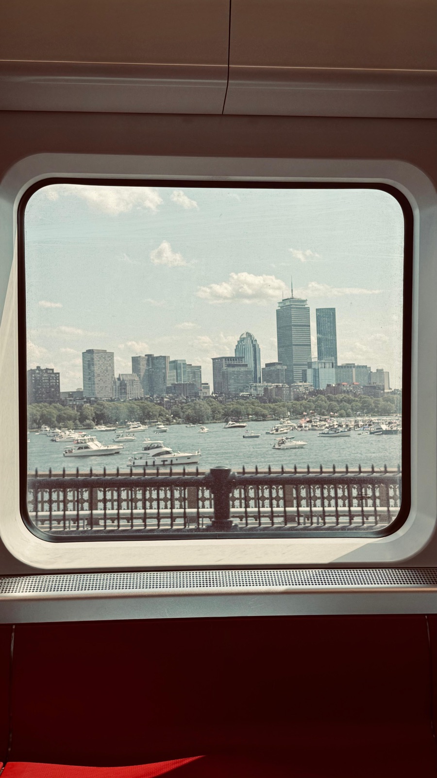 Boston skyline framed through a train window